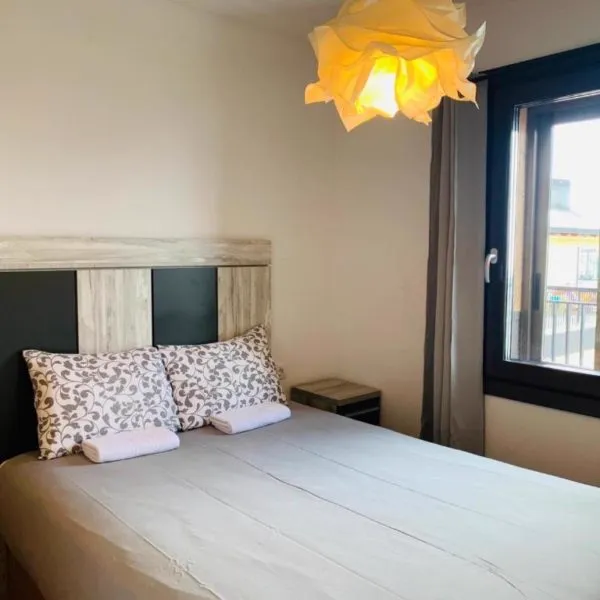 Dormitorio de un apartamento de montaña